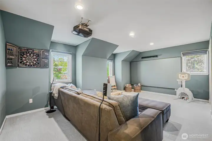 Upstairs bonus room converted into a home theater.