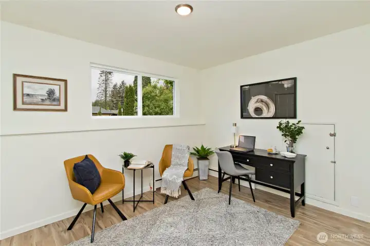 Bedroom downstairs. Staged as an office.