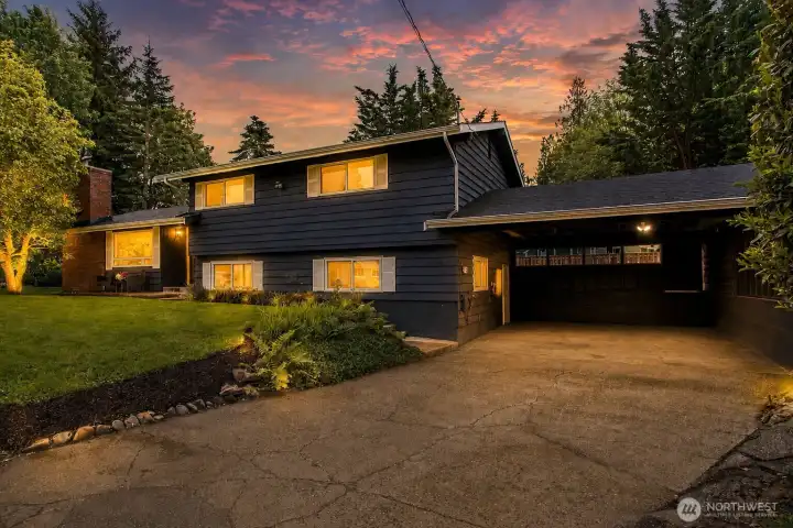 Front of the home at the driveway.
