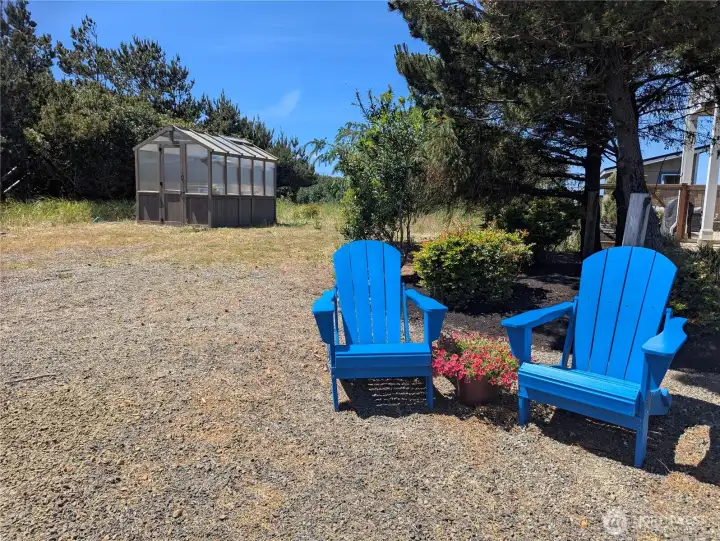 Spacious, private oceanfront lot complete with greenhouse and shed