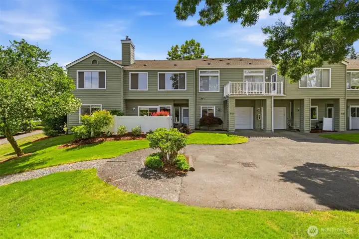 Charming Garden Village home with attached one-car garage, driveway parking, and private fenced patio. Charming Garden Village home with attached one-car garage, driveway parking, and private fenced patio.