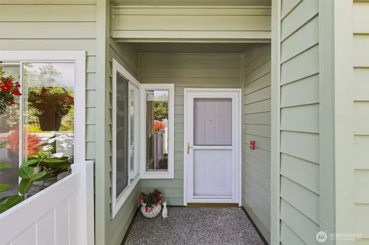 Inviting covered front entrance with attractive architectural details and nearby guest parking. Inviting covered front entrance with attractive architectural details and nearby guest parking.