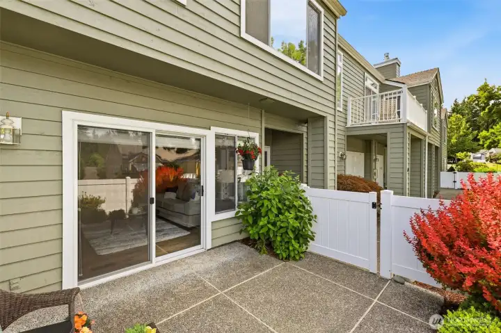 Large sliding glass door fills the living area with natural light and provides easy patio access. Large sliding glass door fills the living area with natural light and provides easy patio access.