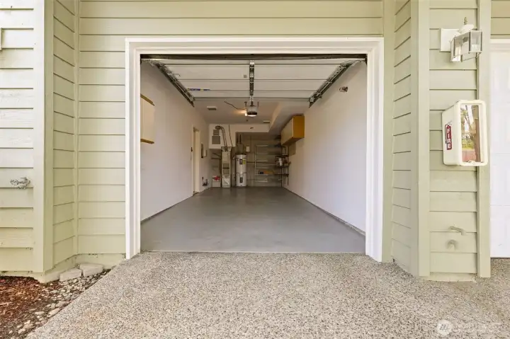 Garage includes shelving and convenient access to the home. Garage includes shelving and convenient access to the home.
