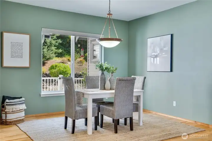 This inviting dining area is perfectly suited for everything from intimate dinners to holiday gatherings with family and friends
