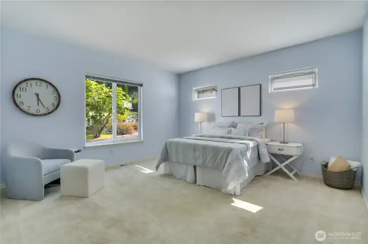Retreat to the serene primary suite, where generous proportions, a walk-in closet, and a spa-like bath create the perfect place to unwind