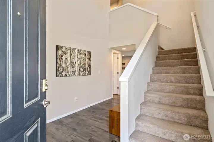 Entry leading to upstairs or the main living space.