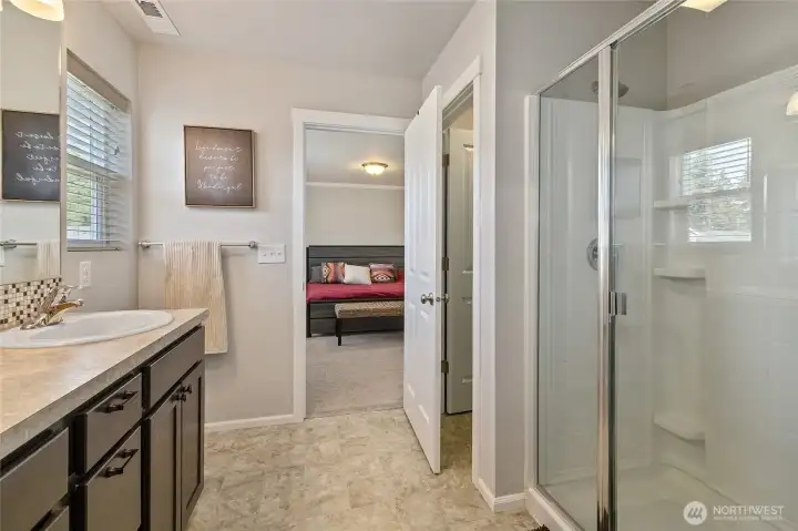 en-suite with double sinks, walk in shower and private toliet closet.
