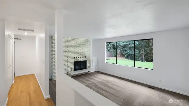 Home enters into formal living room with tons of natural light.