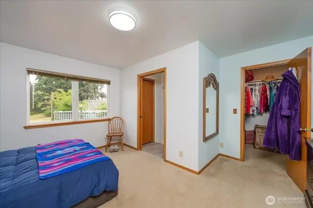 Primary bedroom with walk-in-closet and updated ensuite.