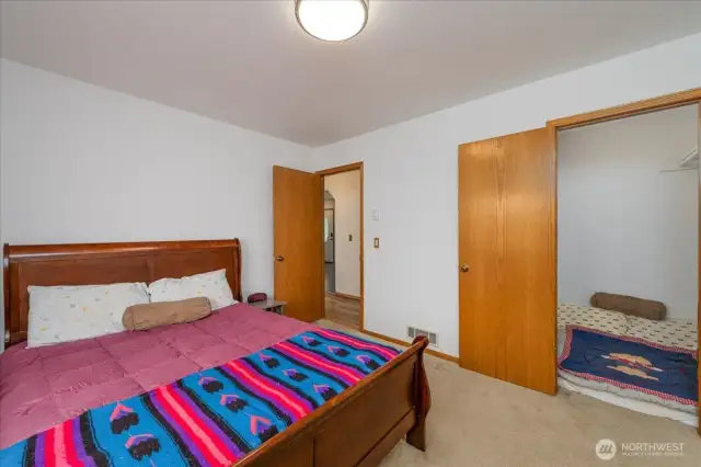 Guest bedroom with large walk-in-closet.