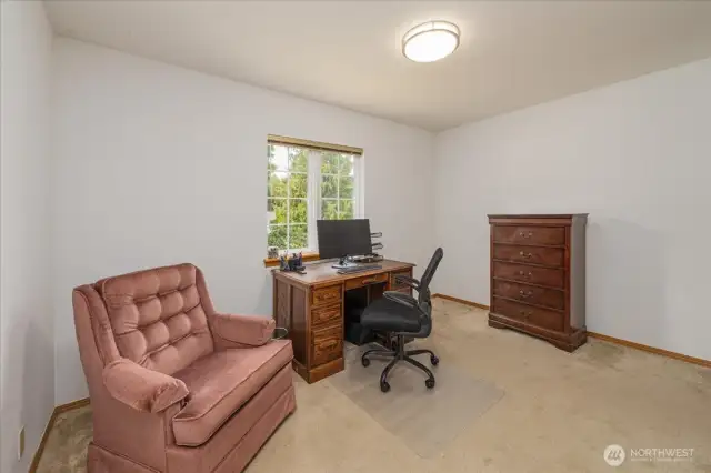Guest bedroom with another large closet.