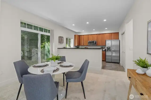 Dining area + Kitchen with eating space **Staged**