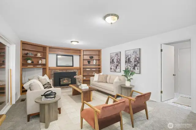 Den opening to expansive backyard