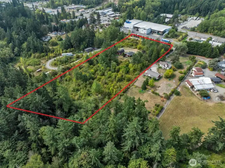 Red line is approximately where property line is.