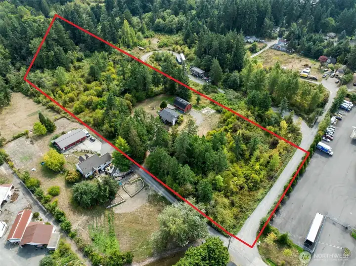 Red line is approximately where property line is.
