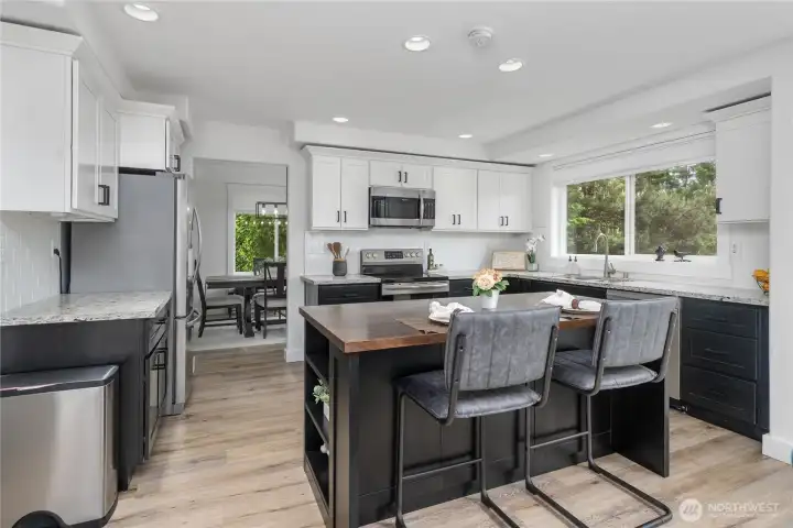 Kitchen leads to dining room/ Sitting area
