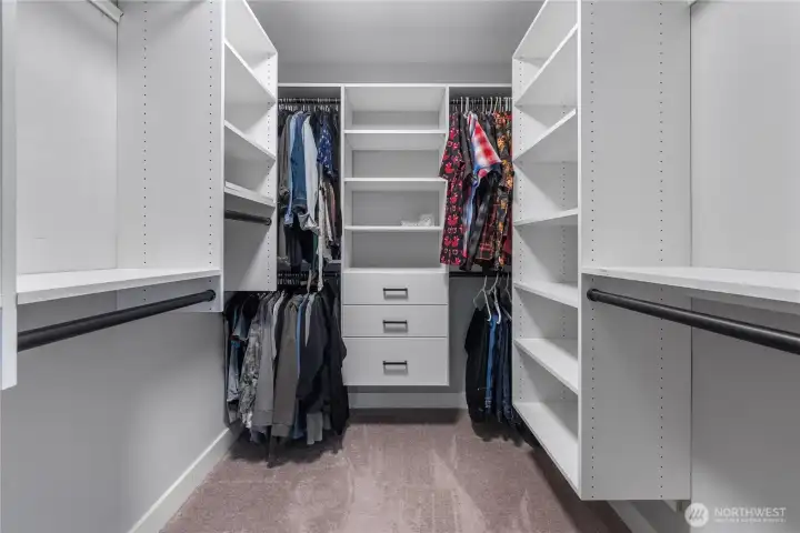 Enormous walk-in closet in the primary bedroom