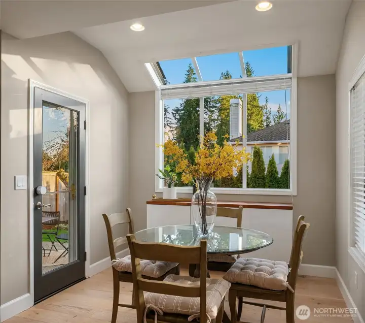 Breakfast Nook w Solarium Windows - Let the Sunshine In! Walkout Atrium Door to Rear Yard.