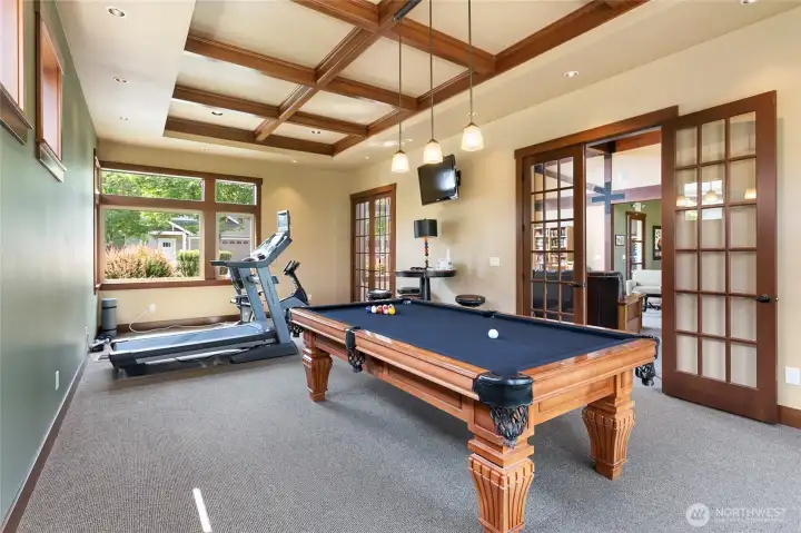 Some fitness equipment and pool table to enjoy at clubhouse