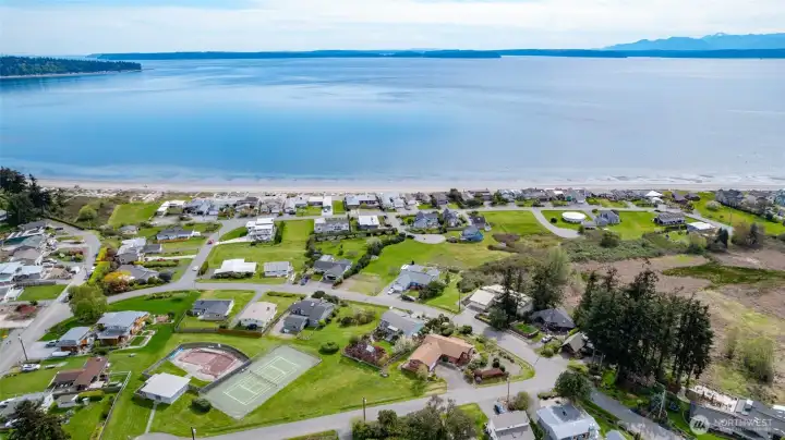 Right next to the sports court and swimming pool!