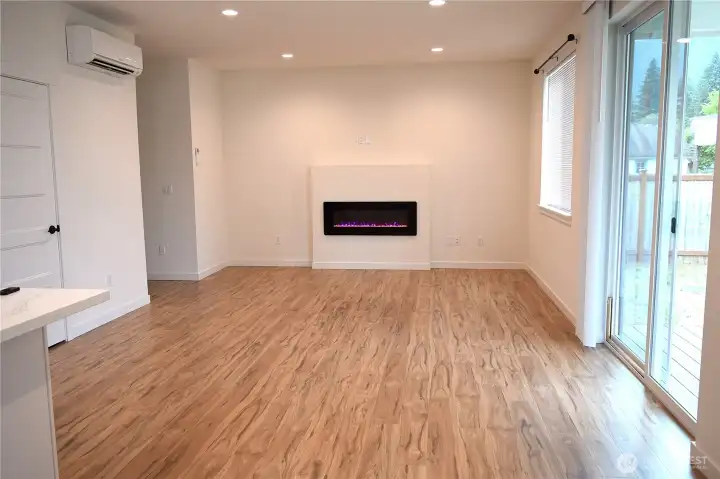 Living room electric fireplace with several different colors. Living room electric fireplace with several different colors.
