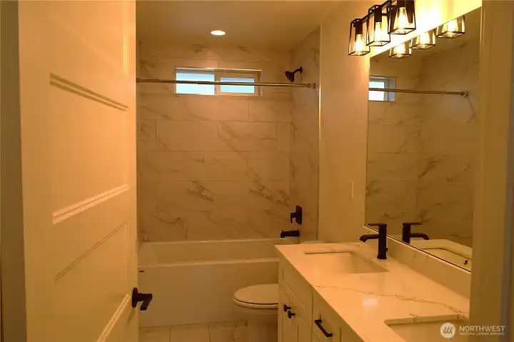 Guest bathroom w/ soaker tub & double sinks Guest bathroom w/ soaker tub & double sinks