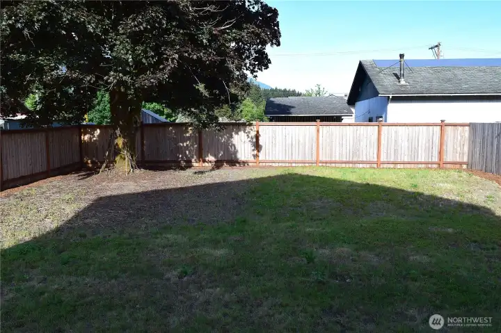 Large fenced back yard Large fenced back yard