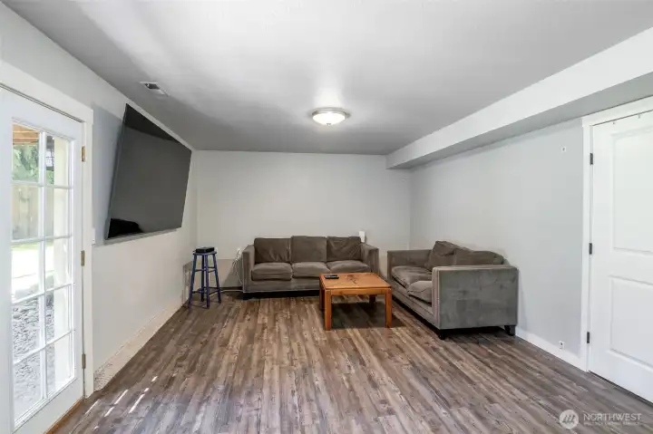 Bonus room. Downstairs.
