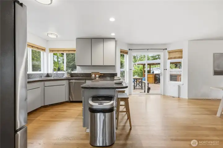 Kitchen overlooks Deck & Backyard Kitchen overlooks Deck & Backyard