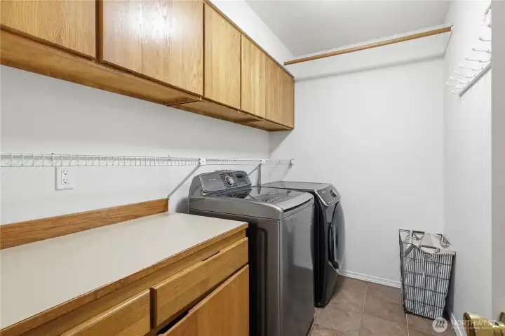 Dedicated Laundry Room with Cabinets. Dedicated Laundry Room with Cabinets.