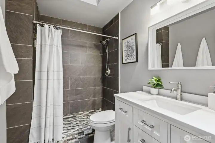 Hallway Bathroom with Tiled Shower. Hallway Bathroom with Tiled Shower.