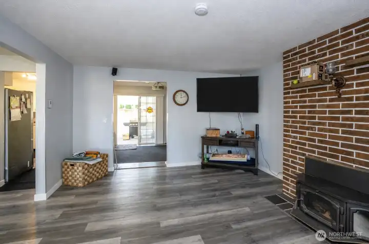 The living area flows effortlessly into the kitchen and dining space, creating an open and inviting atmosphere.
