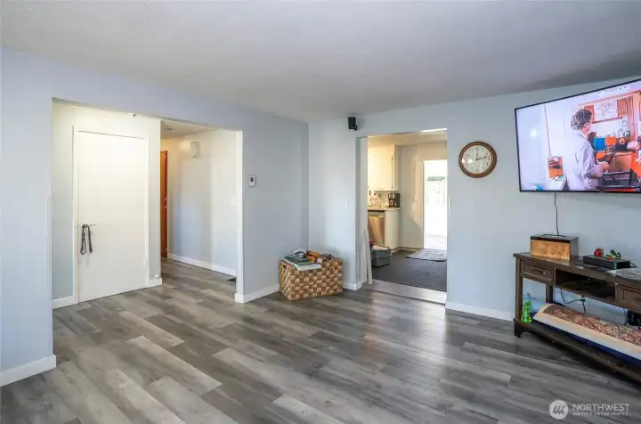 Durable and attractive luxury vinyl plank flooring extends throughout the home.