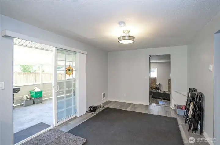 Dining area with a convenient doorway connecting to the family room, creating an easy and functional flow between living spaces.