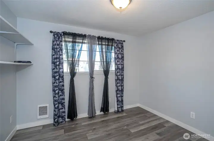 Guest suite #2 offering a comfortable and versatile space for visitors or flexible use.