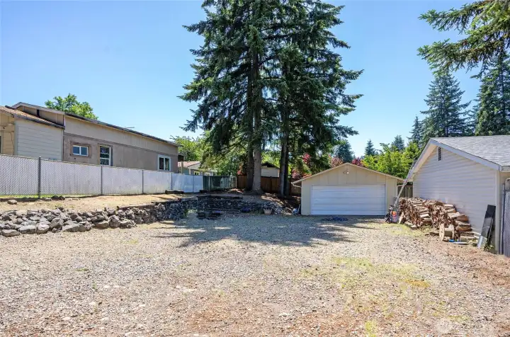 Plenty of space for additional vehicles or recreational toys, with the detached garage offering valuable extra storage and functionality.