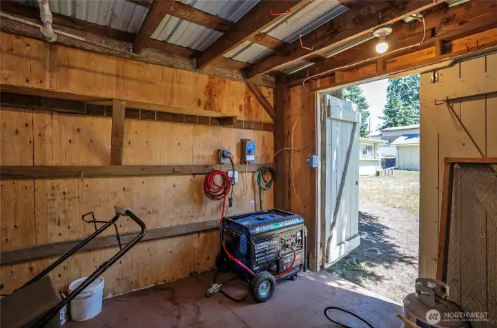 Better view of the interior showcasing the portable generator and its setup.