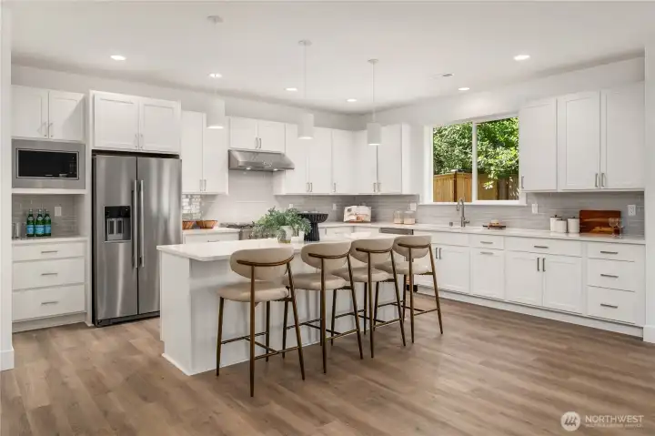 *Interior photos are from model home - Same floorplan, mirrored. **Kitchen cabinets are dark wood in this Lot.
