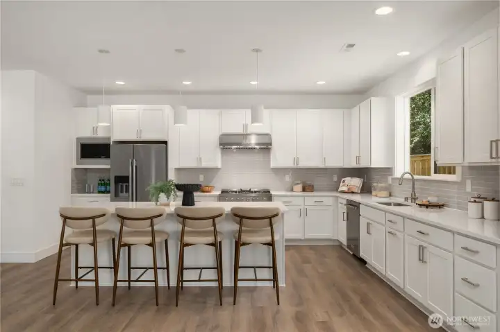 *Interior photos are from model home - Same floorplan, mirrored. **Kitchen cabinets are dark wood in this Lot.