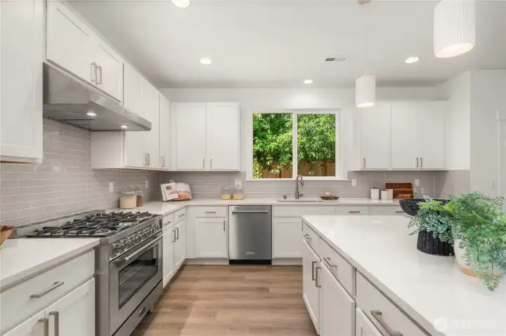 *Interior photos are from model home - Same floorplan, mirrored. **Kitchen cabinets are dark wood in this Lot.