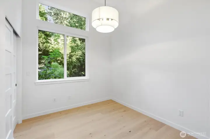 Second bedroom upstairs also has vaulted ceilings and an extra window to let more light in. Second bedroom upstairs also has vaulted ceilings and an extra window to let more light in.