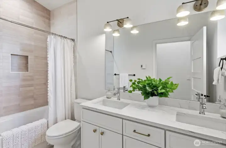 Even the hallway guest bath still has nice finishes and shower surround. Even the hallway guest bath still has nice finishes and shower surround.