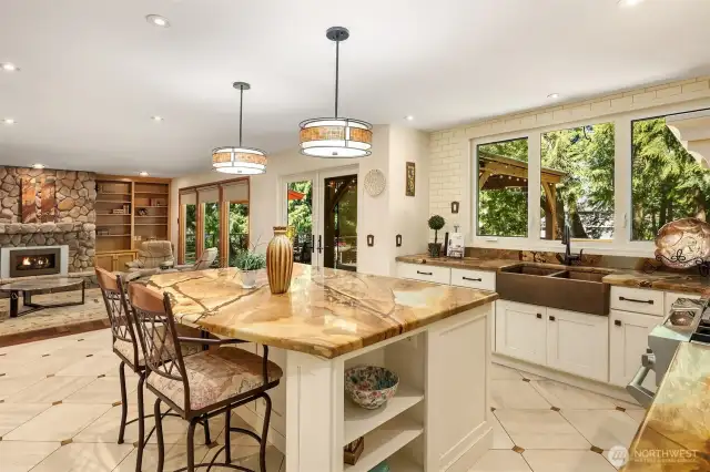 The kitchen flows right into the family room, which opens out onto a large outdoor deck. It's the perfect place for entertaining or relaxing on a beautiful day.