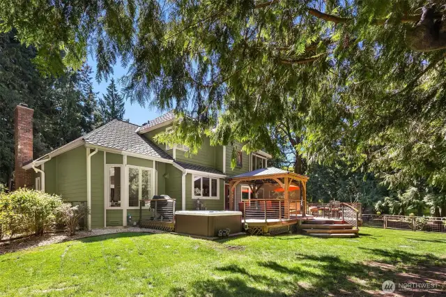 This house offers the best of both worlds. There is a large, private, fenced-in backyard that is perfect for entertaining or relaxing in the sun. Plus, the interior is designed to maximize the view while providing ample space to live and thrive.