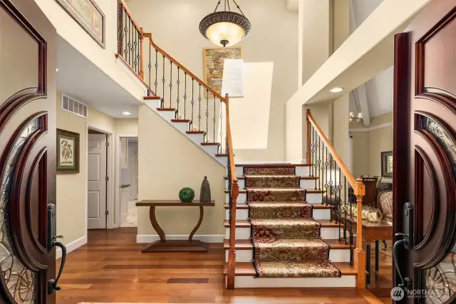 This home's Grand Foyer offers plenty of natural light and welcoming features, making it a perfect place to host your guests.