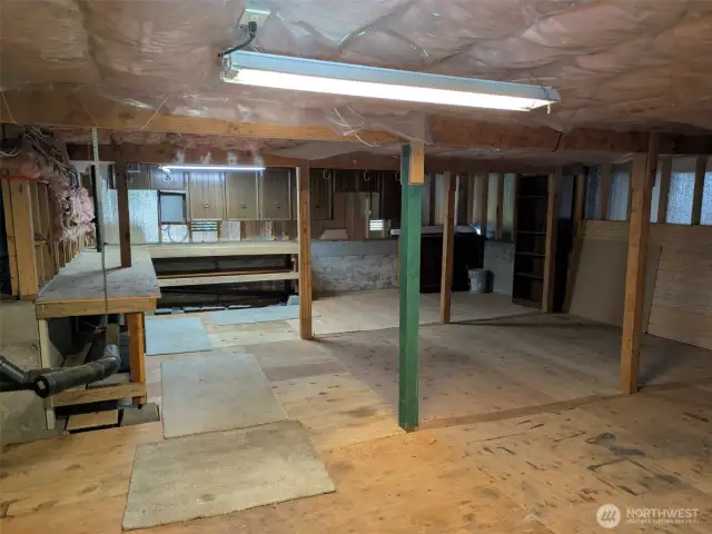 The storage & workshop area is large, well-lit, and comfortable to work on all your projects!