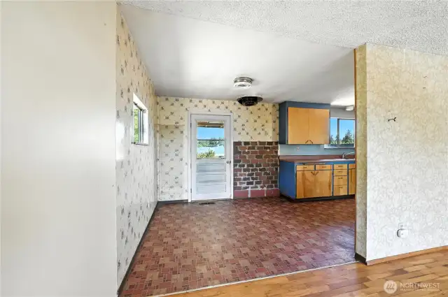 Dining area with back door to deck