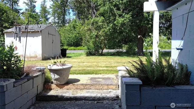 Looking out to back yard from slider-pre-fence