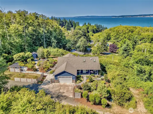 Tucked away on the Hansville Hillside, with stunning views of Puget Sound and Mt Baker